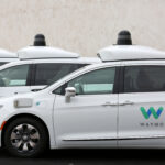 Waymo Taxi Frozen by Construction Worker's Stop Sign Dilemma